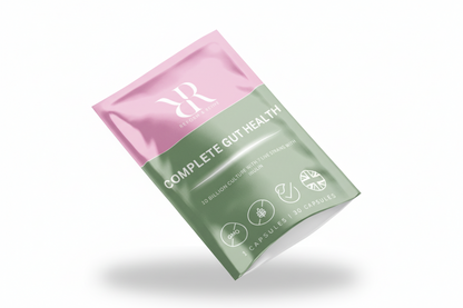 Green and pink package of 'Complete Gut Health' on a white background