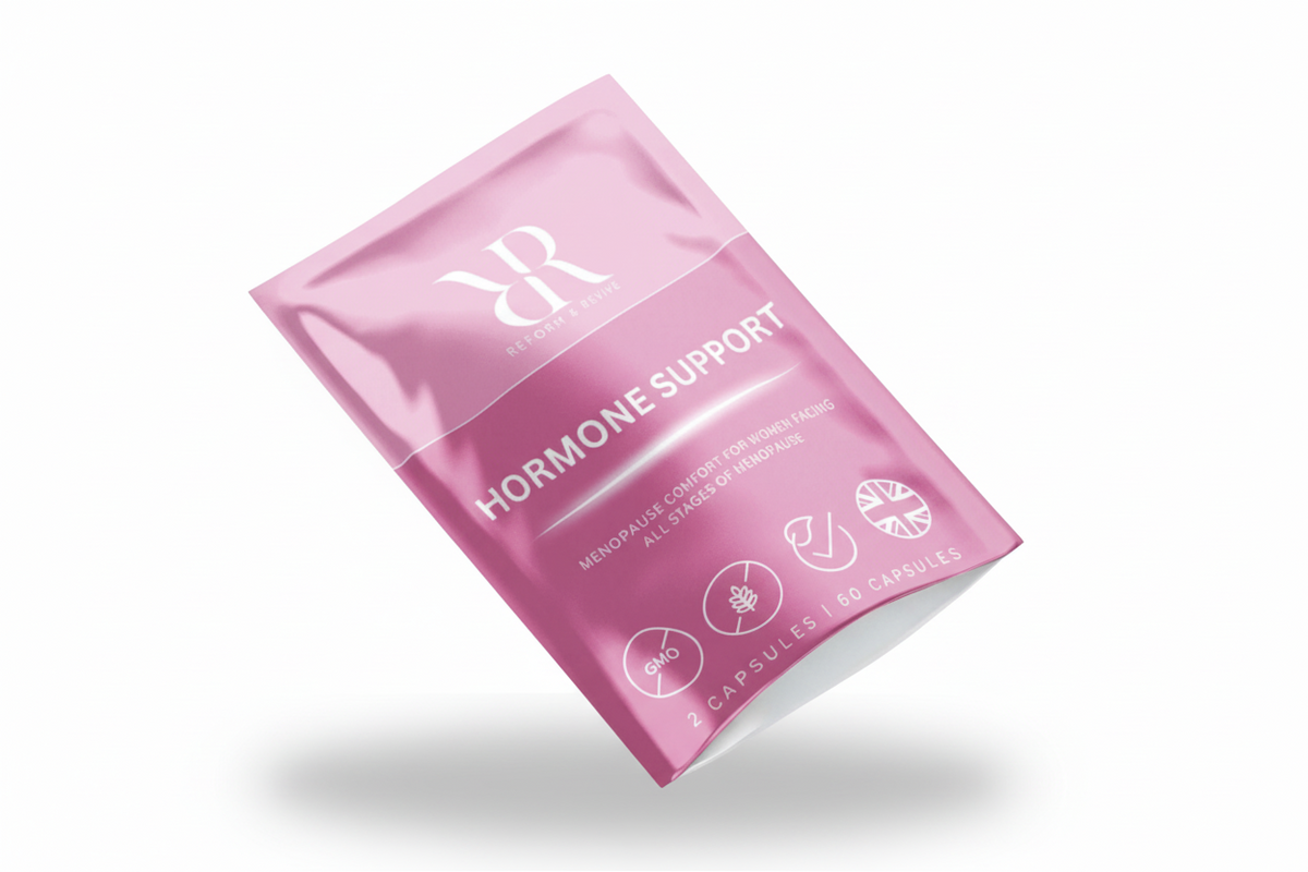 Pink packaging of hormone support capsules on a white background