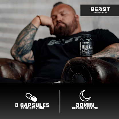Man with tattoos sitting on a couch next to a bottle of Beast Pharm supplements.