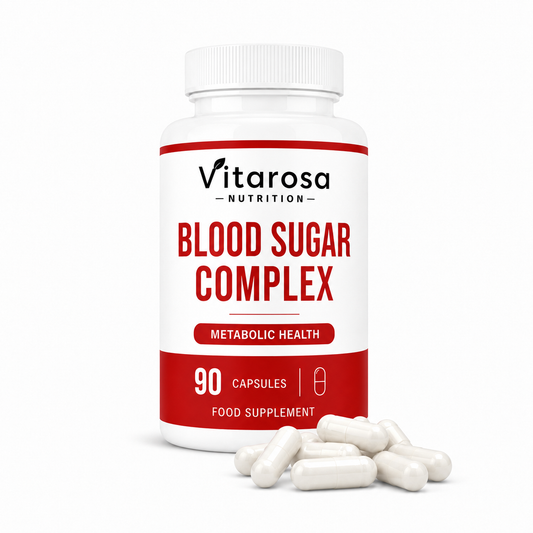 A white bottle of Vitarosa Nutrition Blood Sugar Complex food supplement with red and black text, shown on a white background with several white capsules in front.