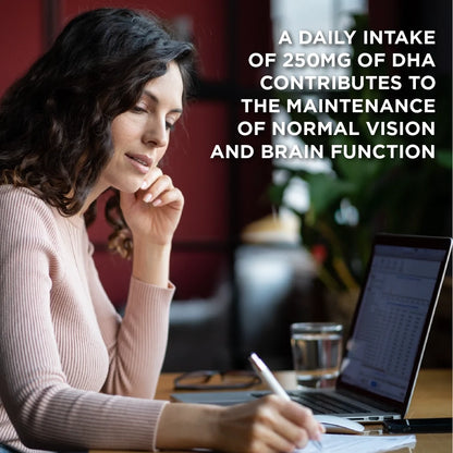 Woman at a laptop with DHA vision and brain-function information