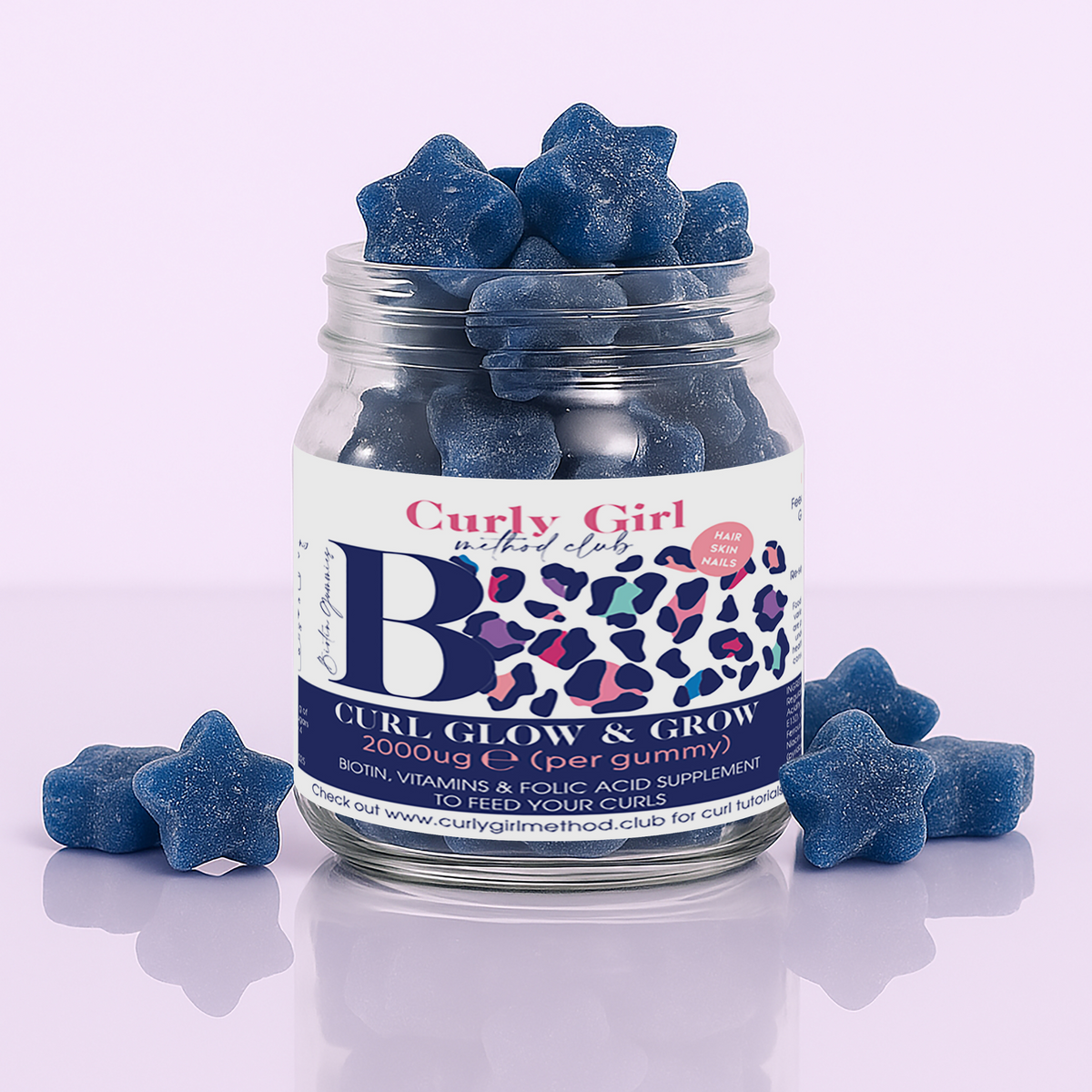 Curly Girl Method Club Grow + Glow Biotin+ hair vitamins jar with blue star-shaped gummies
