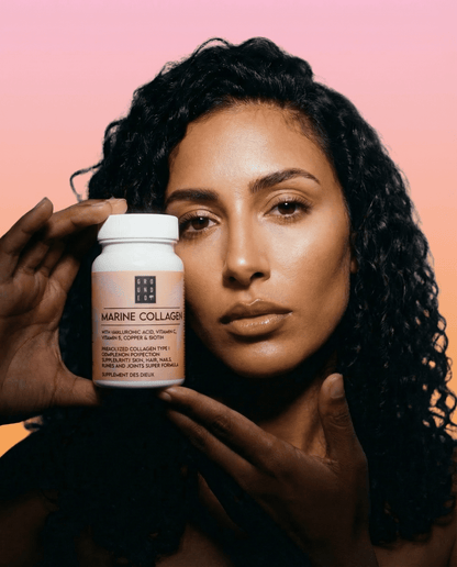 Grounded Marine Collagen Complex Tablets – tablet bottle held by customer