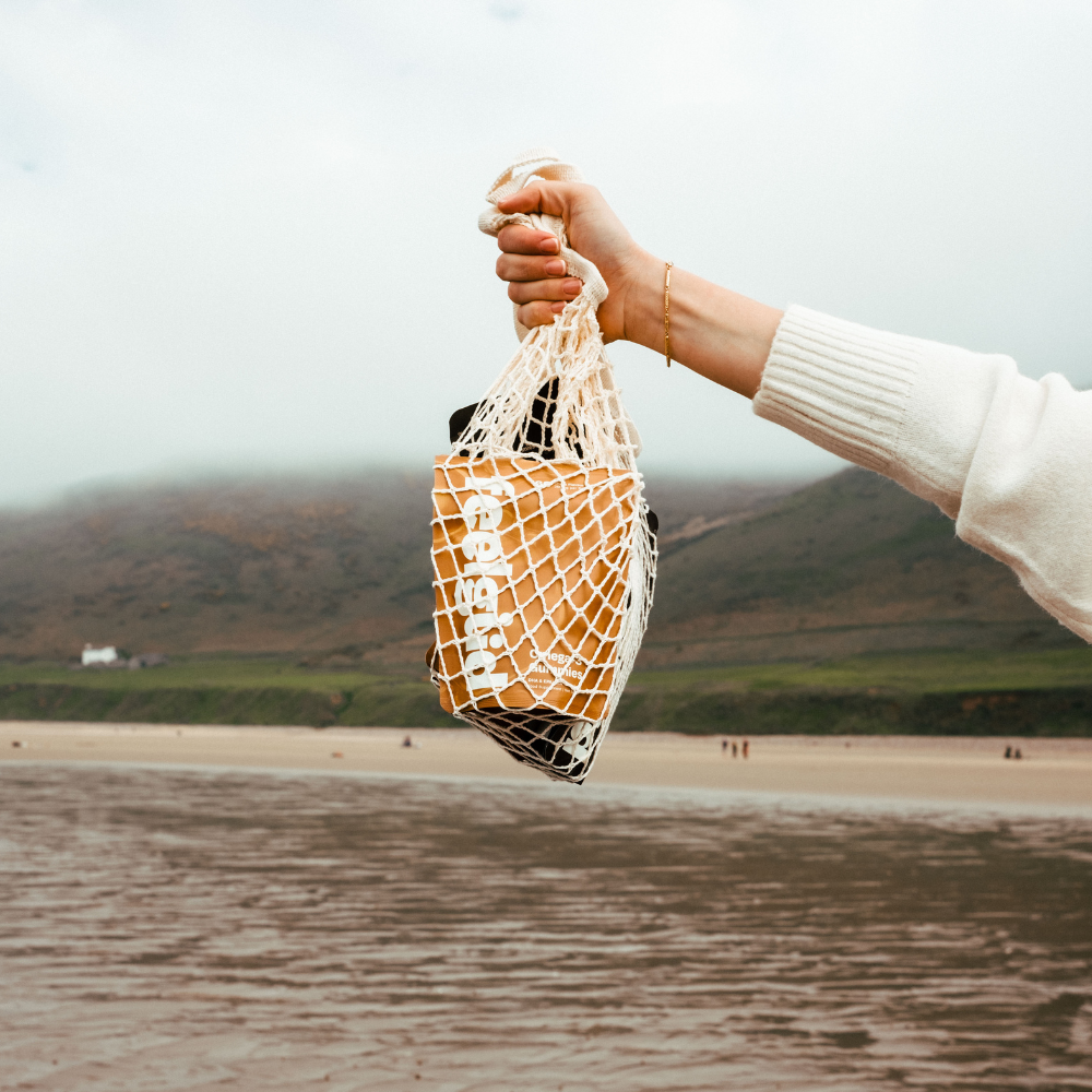 FeelGüd Omega-3 Gummies – pouch in a shopping bag