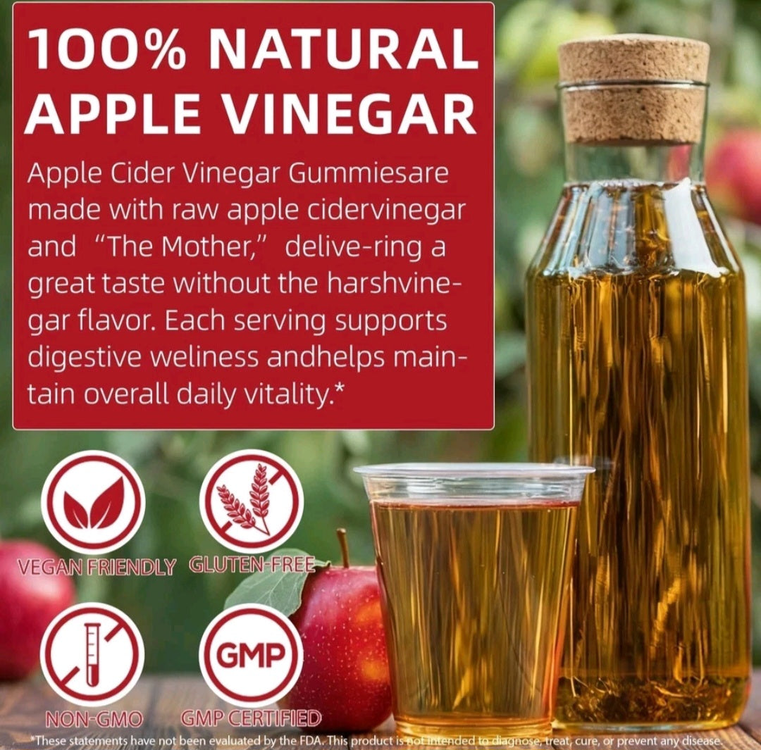 A bottle of apple cider vinegar with a cork stopper and a small clear cup filled with golden liquid, set against a blurred apple farm background. A large red text panel reads '100% NATURAL APPLE VINEGAR' with descriptive copy, and three certification-style icons appear at the lower left.