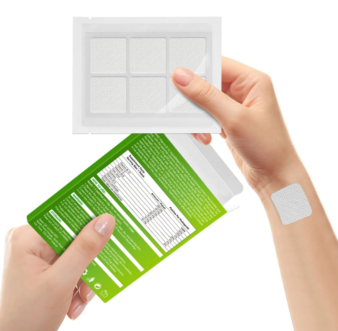 Person holding a green package with a white patch, showing the patch on their wrist.